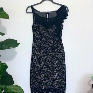The Limited Dress in Black Lace and cream colors. Size S.